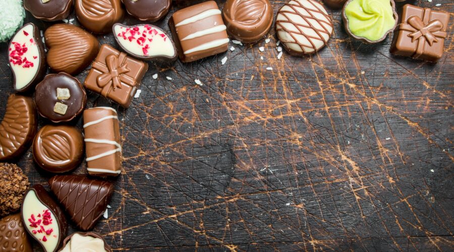 Chocolate sweets with nuts and various fillings.