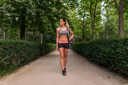 Sportswoman walking on a park