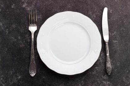 Vintage cutlery on dark background