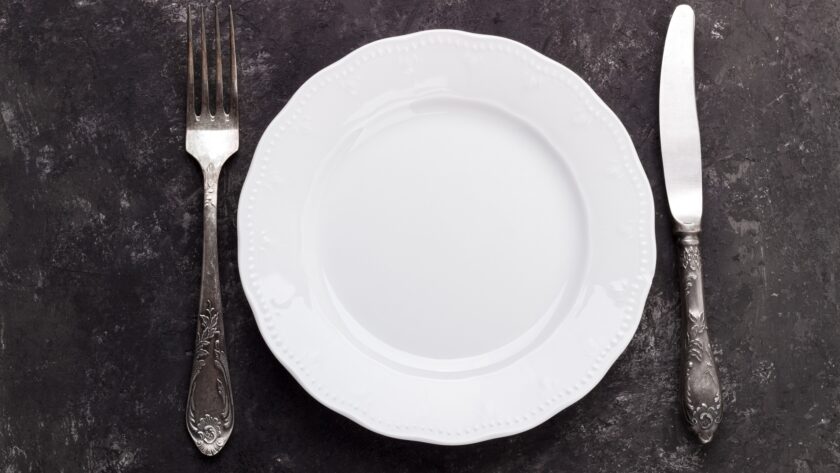 Vintage cutlery on dark background