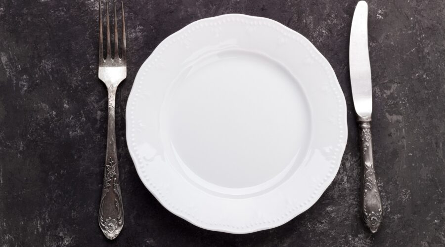 Vintage cutlery on dark background